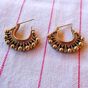 Vintage Met Museum gold earrings.